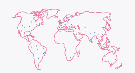 Simplified pink world map with scattered blue dots representing various locations across continents on a white background.
